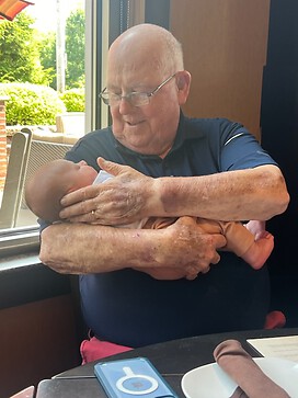 First time meeting great grandson.