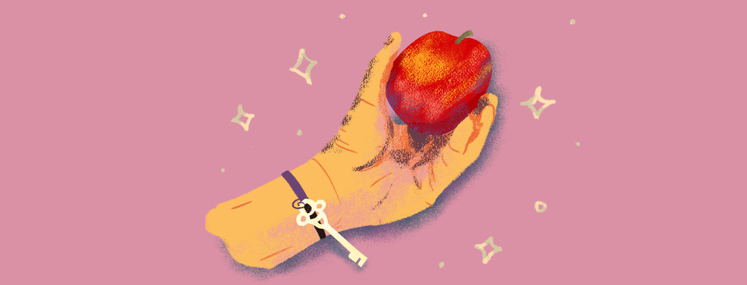 Hand gripping an apple; a key dangles from the wrist.