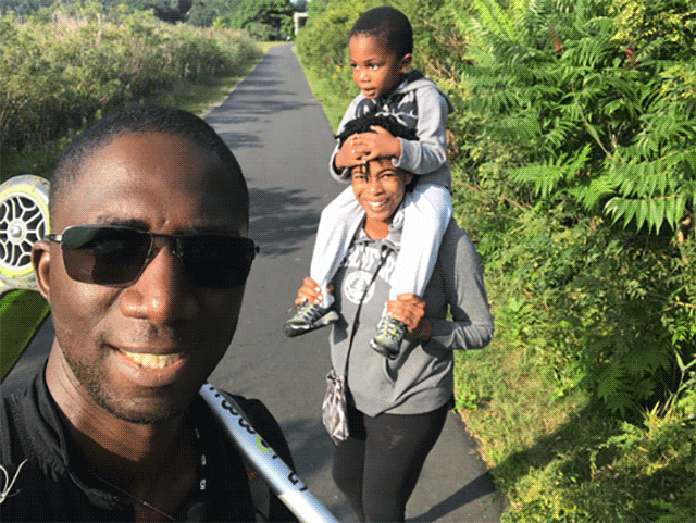 Heart Failure advocate Bouba, his wife and their son on a walk